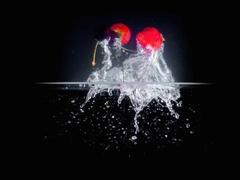 Fruit Splashing into water. Stock Photos