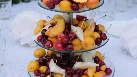 Fruit on a stand panorama, peaches, cherry. Stock Footage 153359725