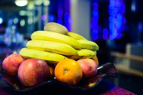 Fruit on the table in a cafe on a bokeh background Stock Photos