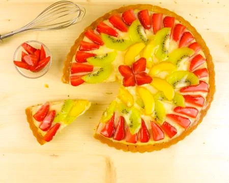 Fruit tart on wooden background - top view Stock Photos