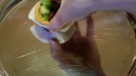 Fruit tartlets preparing Video stock 75817226