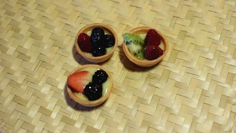 Fruit tartlets preparing Video stock 75817255