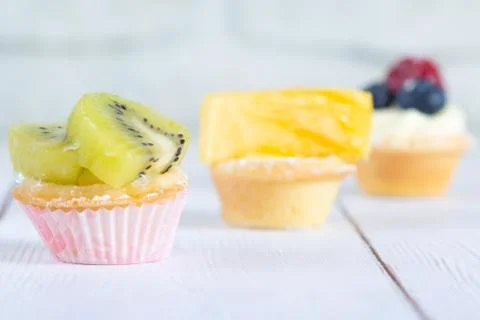 Fruit tartlets on the table Stock Photos