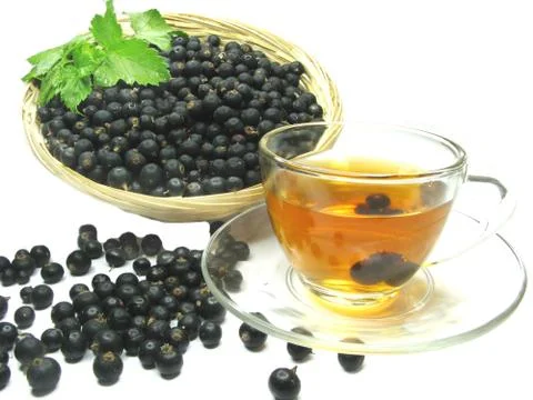 Fruit tea with black currant extract Stock Photos