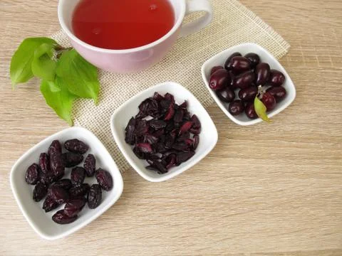 Fruit tea with dried cornelian cherry Stock Photos