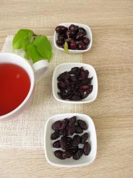 Fruit tea with dried cornelian cherry Stock Photos
