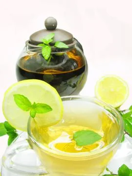 Fruit tea with lemon and mint Stock Photos
