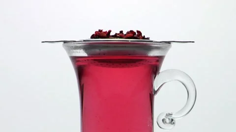 Fruit tea in a tea glass Stock Footage 8572990