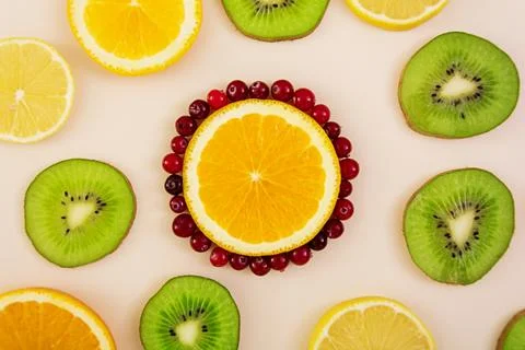 Fruit texture. Background of various sliced fruits Stock Photos