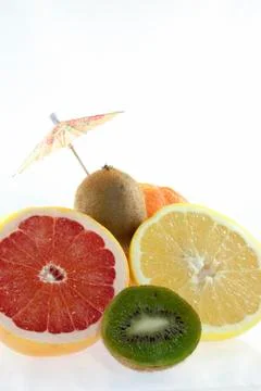 Fruit with umbrella Stock Photos