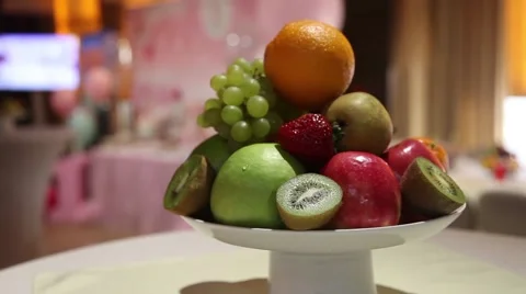 Fruit in a vase on the table 스톡 동영상 64289600