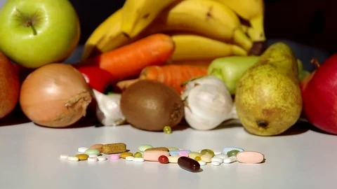 Fruit, vegetables, or medicines ? Stock Footage 69937601