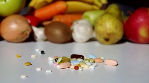 Fruit, vegetables, or medicines ? Stock Footage 69937656