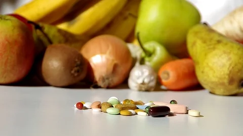 Fruit, vegetables, or medicines ? Stock Footage 69938497