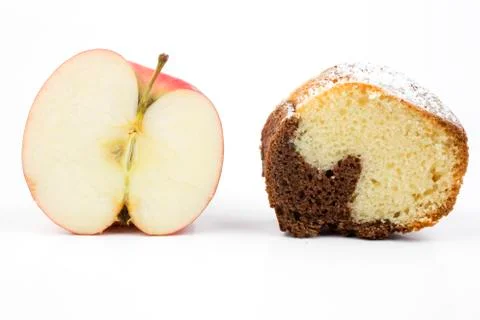 Fruit versus cake Stock Photos