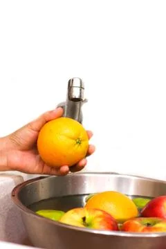 Fruit washing Stock Photos
