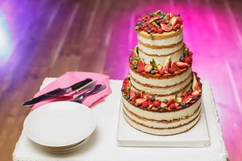 Fruit wedding cake at the Banquet. Cutlery Stock Photos