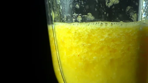 Fruit Yellow Blender Smoothie macro view cooking in slow motion 스톡 동영상 106672645