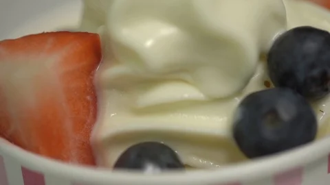 Fruit in yogurt Stock Footage 104289556