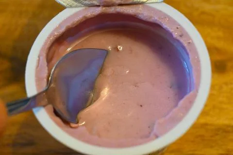 Fruit yogurt with spoon Stock-Fotos