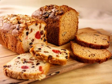 A fruitcake and a date and nut cake Stock Photos