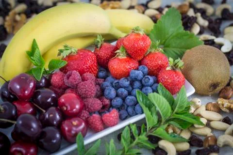 Fruits and nuts Stock Photos
