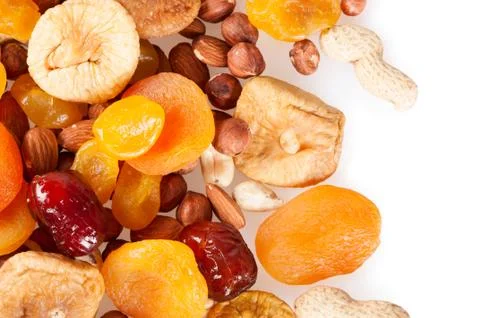 Fruits and nuts on a white background Foto stock