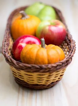 Fruits and pumpkins Stock Photos