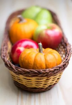 Fruits and pumpkins Stock Photos