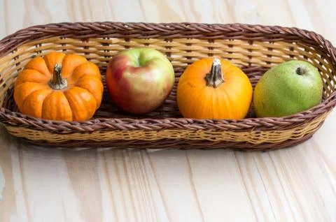 Fruits and pumpkins Stock Photos