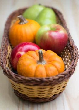 Fruits and pumpkins Stock Photos