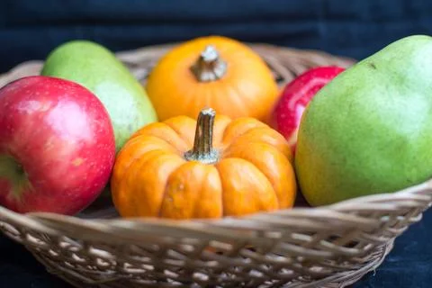 Fruits and pumpkins Stock Photos
