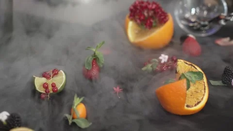 Fruits and snacks on a black tablecloth 스톡 동영상 304353096
