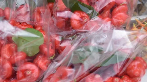 Fruits and vegetable are packed in plastic bags Stock Footage 130138949