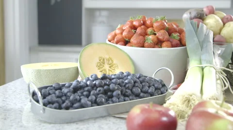 Fruits and Vegetable display on a kitchen worktop dolly right Stock Footage 63780027