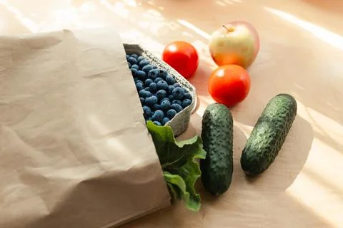 Fruits and vegetables on a kitchen table bought at an organic grocery store.. Stock-Fotos