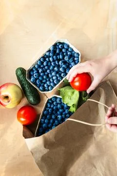 Fruits and vegetables on a kitchen table bought at an organic grocery store.. Foto stock