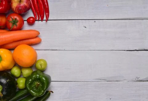 Fruits and vegetables on table.- Stock Photos