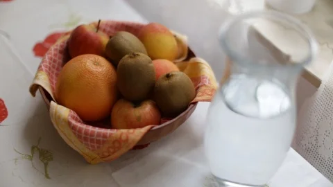 The fruits are on the table and are touched by the owner Stock Footage 116560266