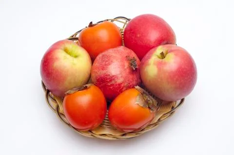 Fruits on a basket plate Stock Photos