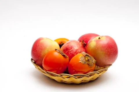 Fruits on a basket plate Stock Photos