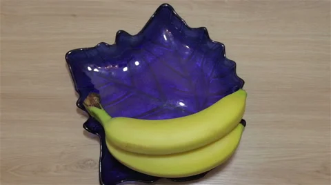 Fruits in the blue plate Stock Footage 62483642