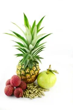 Fruits capsules on white background Stock Photos
