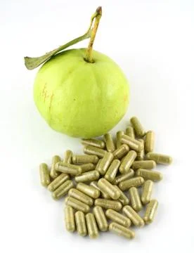 Fruits capsules on white background Foto stock