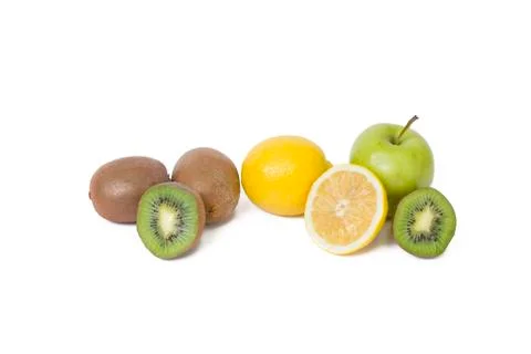 Fruits in a composition on a white background. Lemon with apples and kiwi on Stock Photos
