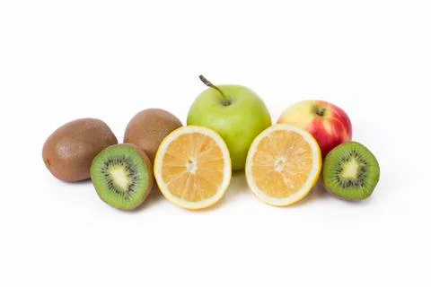 Fruits in a composition on a white background. Lemon with apples and kiwi on Stock Photos