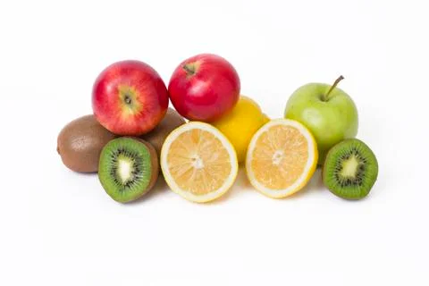 Fruits in a composition on a white background. Lemon with apples and kiwi on Stock Photos