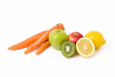 Fruits in a composition on a white background. Lemon with apples and kiwi on Stock Photos