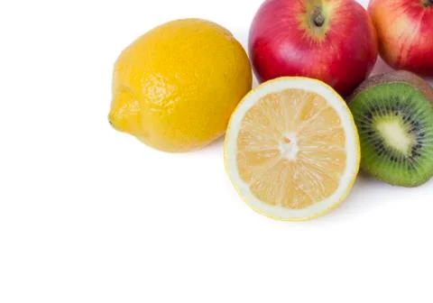 Fruits in a composition on a white background. Lemon with apples and kiwi on Stock Photos