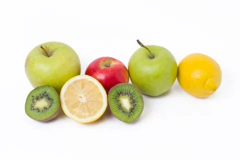 Fruits in a composition on a white background. Lemon with apples and kiwi on Stock Photos